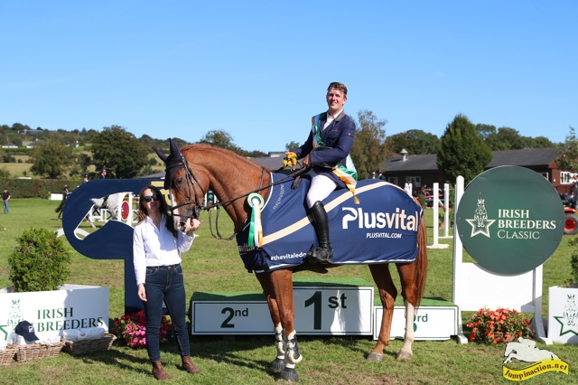 Plusvital 1.55/1.60m Grand Prix 2023 Winner Johnathan Smyth been presented with his Plusvital Hamper from Clare Silke on behalf of Plusvital and Irish Breeders Classic.